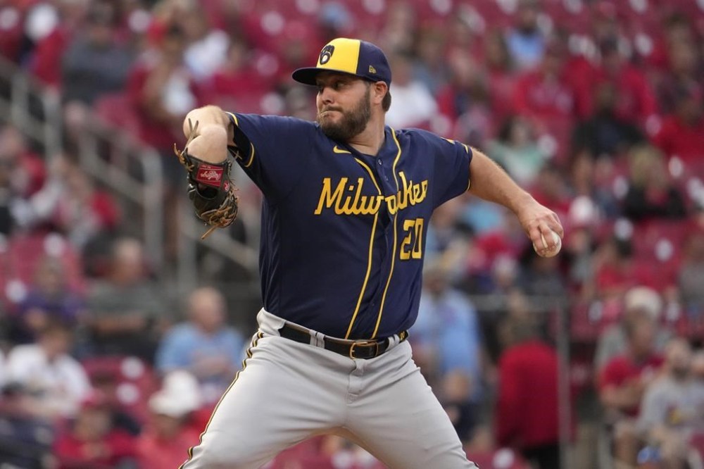 Milwaukee Brewers starting pitcher Wade Miley throws during the first inning of a baseball game against the St. Louis Cardinals Tuesday, May 16, 2023, in St. Louis. (AP Photo/Jeff Roberson)