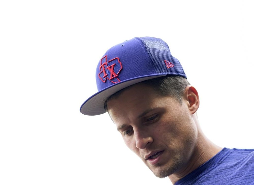 Texas Rangers' Corey Seager, currently on the injured list, jogs on the field during batting practice before a baseball game against the Seattle Mariners, Monday, May 8, 2023, in Seattle. (AP Photo/Lindsey Wasson)