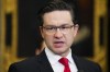Conservative Leader Pierre Poilievre speaks to reporters in the foyer of the House of Commons on Parliament Hill in Ottawa on Tuesday, May 16, 2023. THE CANADIAN PRESS/Sean Kilpatrick