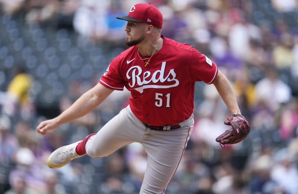 Cincinnati Reds starting pitcher Graham Ashcraft works against the Colorado Rockies in the first inning of a baseball game Wednesday, May 17, 2023, in Denver. (AP Photo/David Zalubowski)