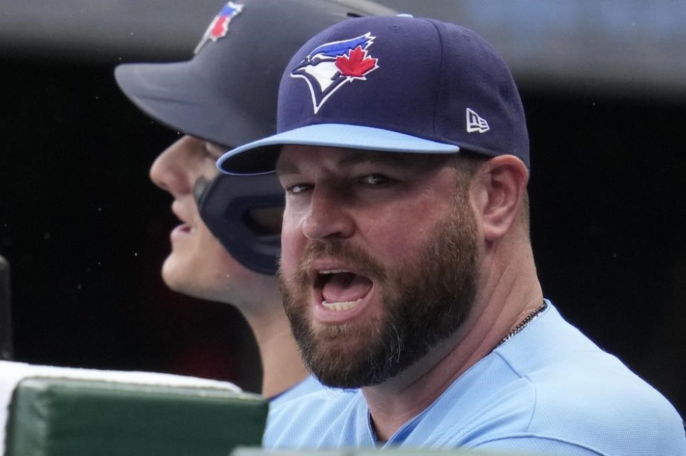 Toronto Blue Jays manager John Schneider stands in the dugout during the first inning of a baseball game against the Pittsburgh Pirates in Pittsburgh, Sunday, May 7, 2023. (AP Photo/Gene J. Puskar)