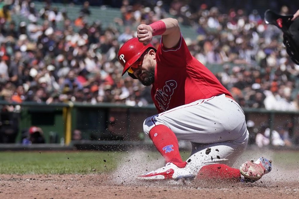 Philadelphia Phillies' Kyle Schwarber scores against the San Francisco Giants during the fourth inning of a baseball game in San Francisco, Wednesday, May 17, 2023. (AP Photo/Jeff Chiu)