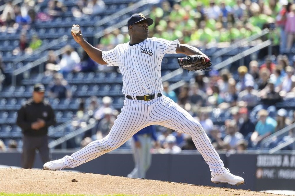 New York Yankees pitcher Luis Severino throws in a minor league baseball against the Omaha Storm during a rehab assignment with the Scranton/Wilkes-Barre RailRiders, Wednesday, May 10, 2023, at PNC Field in Moosic, Pa. (Christopher Dolan/The Times-Tribune via AP)