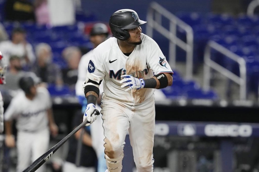 Miami Marlins Luis Arraez (3) watches his 500th career hit into center field during the eighth inning of a baseball game against the Washington Nationals, Wednesday, May 17, 2023, in Miami. (AP Photo/Marta Lavandier)