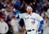 Toronto Blue Jays designated hitter Danny Jansen (9) celebrates his walk off three-run home run against the New York Yankees during 10th inning MLB American League baseball action in Toronto, on Wednesday, May 17, 2023. THE CANADIAN PRESS/Frank Gunn