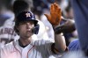 Houston Astros' Jake Meyers celebrates in the dugout after hitting a two-run home run against the Chicago Cubs during the ninth inning of a baseball game Wednesday, May 17, 2023, in Houston. (AP Photo/David J. Phillip)