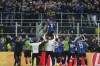 Inter Milan's Lautaro Martinez, centre, celebrates after scoring his side's opening goal during the Champions League semifinal second leg soccer match between Inter Milan and AC Milan at the San Siro stadium in Milan, Italy, Tuesday, May 16, 2023. (AP Photo/Antonio Calanni)