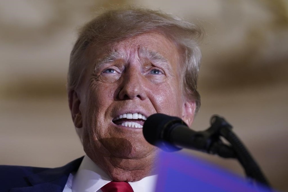 FILE - Former President Donald Trump speaks at his Mar-a-Lago estate April 4, 2023, in Palm Beach, Fla., after being arraigned earlier in the day in New York City. Election falsehoods are thriving on Twitter after Trump dug in on these claims at a CNN town hall, despite Twitter owner Elon Musk's insistence that false stolen-election claims on the platform “will be corrected.” An analysis shows the 10 most widely shared tweets promoting a “rigged election” narrative in the five days after the town hall have not been labeled or removed. (AP Photo/Evan Vucci, File)