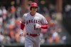 Los Angeles Angels designated hitter Shohei Ohtani runs the bases after hitting a home run against the Baltimore Orioles during the first inning of a baseball game at Oriole Park at Camden Yards, Thursday, May 18, 2023, in Baltimore. (AP Photo/Jess Rapfogel)