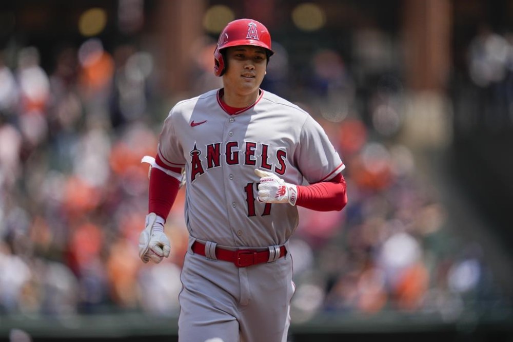 Los Angeles Angels designated hitter Shohei Ohtani runs the bases after hitting a home run against the Baltimore Orioles during the first inning of a baseball game at Oriole Park at Camden Yards, Thursday, May 18, 2023, in Baltimore. (AP Photo/Jess Rapfogel)