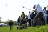 Brooks Koepka hits from the rough on the 11th hole during the first round of the PGA Championship golf tournament at Oak Hill Country Club on Thursday, May 18, 2023, in Pittsford, N.Y. (AP Photo/Seth Wenig)