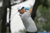 Tom Kim, of South Korea, watches his tee shot on the second hole during the first round of the Byron Nelson golf tournament in McKinney, Texas, Thursday, May 11, 2023. (AP Photo/LM Otero)