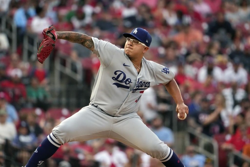 Los Angeles Dodgers starting pitcher Julio Urias throws during the first inning of a baseball game against the St. Louis Cardinals Thursday, May 18, 2023, in St. Louis. (AP Photo/Jeff Roberson)