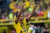 Dortmund's Jude Bellingham waves to supporters after the German Bundesliga soccer match between Borussia Dortmund and Borussia Moenchengladbach in Dortmund, Germany, Saturday, May 13, 2023. (Bernd Thissen/dpa via AP)