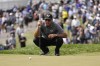 Phil Mickelson lines up a putt on the 18th hole during the second round of the PGA Championship golf tournament at Oak Hill Country Club on Friday, May 19, 2023, in Pittsford, N.Y. (AP Photo/=03370010=)