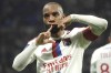 Lyon's Alexandre Lacazette celebrates after scoring his side's opening goal during the French League One soccer match between Lyon and Monaco at the Groupama stadium, in Decines, near Lyon, France, Friday, May 19, 2023. (AP Photo/Laurent Cipriani)