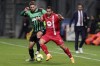 Monza's Gianluca Caprari and Sassuolo's Domenico Berardi battle for the ball during the Serie A soccer match between Sassuolo and Monza at Mapei stadium in Reggio Emilia, Italy, Friday May 19, 2023. (Michele Nucci/LaPresse via AP)
