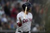 Boston Red Sox's Rafael Devers tosses his bat after hitting a three-run home run during the third inning of a baseball game against the San Diego Padres, Friday, May 19, 2023, in San Diego. (AP Photo/Gregory Bull)