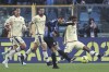 Atalanta's Davide Zappacosta, second from right, scores his side's first goal during the Italian Serie A soccer match between Atalanta and Verona at the Gewiss Stadium in Bergamo, Italy, Saturday, May 20, 2023. (Stefano Nicoli/LaPresse via AP)