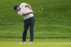 Brooks Koepka hits from the fairway on the seventh hole during the third round of the PGA Championship golf tournament at Oak Hill Country Club on Saturday, May 20, 2023, in Pittsford, N.Y. (AP Photo/Abbie Parr)