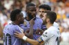 Real Madrid's Vinicius Junior, left, reacts during a Spanish La Liga soccer match between Valencia and Real Madrid, at the Mestalla stadium in Valencia, Spain, Sunday, May 21, 2023. (AP Photo/Alberto Saiz)