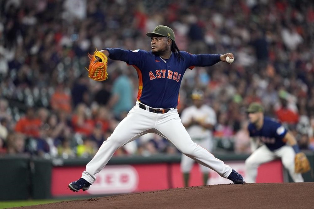 Houston Astros starting pitcher Framber Valdez throws against the Oakland Athletics during the first inning of a baseball game Sunday, May 21, 2023, in Houston. (AP Photo/David J. Phillip)