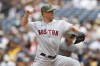 Boston Red Sox starting pitcher Corey Kluber throws to the plate during the first inning of a baseball game against the San Diego Padres, Sunday, May 21, 2023, in San Diego. (AP Photo/Brandon Sloter)