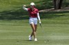 Stanford golfer Rose Zhang check the wind direction on the second fairway during the final round of the NCAA college women's golf championship at Grayhawk Golf Club, Monday, May 22, 2023, in Scottsdale, Ariz. (AP Photo/Matt York)