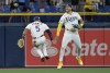 Tampa Bay Rays' Wander Franco (5) and Jose Siri celebrate after a win over the Toronto Blue Jays during a baseball game Monday, May 22, 2023, in St. Petersburg, Fla. (AP Photo/Steve Nesius)