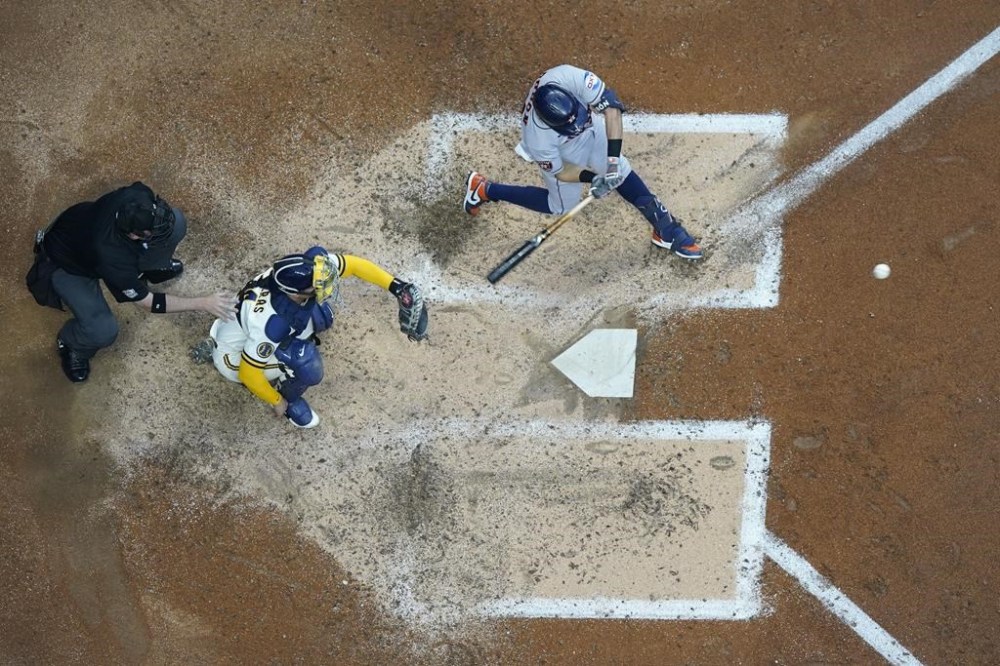 Houston Astros' Mauricio Dubon hits a home run during the fifth inning of a baseball game against the Milwaukee Brewers Monday, May 22, 2023, in Milwaukee. (AP Photo/Morry Gash)