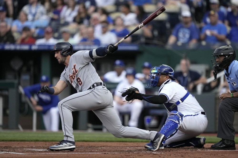 Detroit Tigers' Matt Vierling hits a two-run single during the first inning of a baseball game against the Kansas City Royals Monday, May 22, 2023, in Kansas City, Mo. (AP Photo/Charlie Riedel)