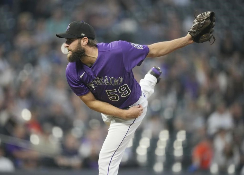 Colorado Rockies relief pitcher Jake Bird works against the Miami Marlins in the sixth inning of a baseball game Monday, May 22, 2023, in Denver. (AP Photo/David Zalubowski)