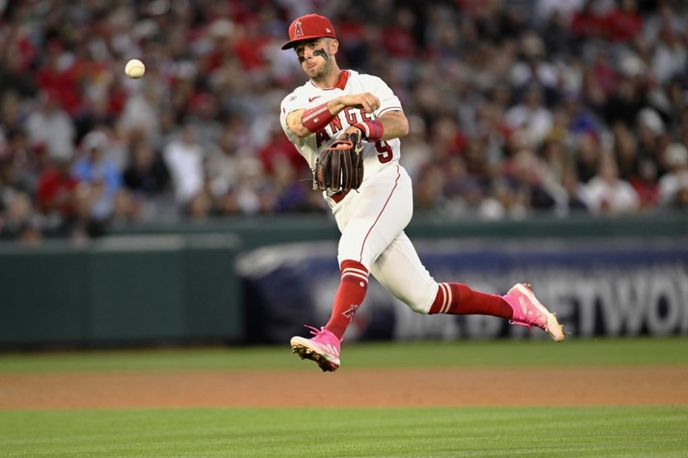 Los Angeles Angels shortstop Zach Neto throws out Boston Red Sox's Alex Verdugo at first during the sixth inning of a baseball game in Anaheim, Calif., Monday, May 22, 2023. (AP Photo/Alex Gallardo)