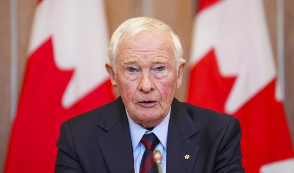 David Johnston, Independent Special Rapporteur on Foreign Interference, presents his first report in Ottawa on Tuesday, May 23, 2023. THE CANADIAN PRESS/Sean Kilpatrick