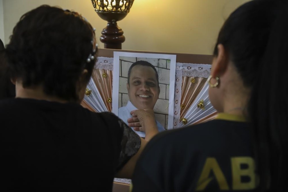 Relatives accompany the remains of Fernando Chavez, 47, one of the soccer fans that died in the recent Cuscatlan stadium stampede, during his funeral in San Salvador, El Salvador, Monday, May 22, 2023. The tragedy occurred when stampeding fans pushed through one of the access gates during a quarterfinal Salvadoran league soccer match between Alianza and FAS. (AP Photo/Salvador Melendez)