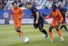 CF Montreal's Matko Miljevic is tripped by Forge FC midfielder Aboubacar Sissoko during first half Canadian Championship quarter-final action in Montreal on Wednesday, May 25, 2022. Familiar foes are set to clash in the Canadian Championship semifinal. Major League Soccer’s CF Montreal and the Canadian Premier League’s Forge FC will face off in the final four of the national soccer tournament for the third straight time when the teams meet Wednesday evening at Stade Saputo.THE CANADIAN PRESS/Paul Chiasson