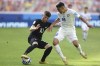 New Zealand's Jay Herdman, left, battles for the ball with Uzbekistan's Bekhruzbek Askarov during a FIFA U-20 World Cup group A soccer match at Madre De Ciudades stadium in Santiago Del Estero, Argentina, Tuesday, May 23, 2023. (AP Photo/Nicolas Aguilera)