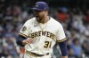 Milwaukee Brewers relief pitcher Joel Payamps reacts after striking out Houston Astros' Jeremy Pena during the sixth inning of a baseball game Tuesday, May 23, 2023, in Milwaukee. (AP Photo/Morry Gash)