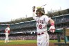 Los Angeles Angels' Mickey Moniak (16) celebrates in the dugout after hitting a home run during the first inning of a baseball game against the Boston Red Sox in Anaheim, Calif., Tuesday, May 23, 2023. (AP Photo/Ashley Landis)