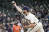 Milwaukee Brewers starting pitcher Adrian Houser throws during the first inning of a baseball game against the Houston Astros Wednesday, May 24, 2023, in Milwaukee. (AP Photo/Morry Gash)