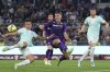 Inter Milan's Lautaro Martinez, left, scores during the Italian Cup final soccer match between Fiorentina and Inter Milan at the Rome's Olympic Stadium, Wednesday, May 24, 2023. (Spada/LaPresse via AP)