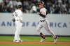 Baltimore Orioles' Adam Frazier, right, smiles as he runs the bases after hitting a three-run home run during the seventh inning of the team's baseball game against the New York Yankees on Wednesday, May 24, 2023, in New York. (AP Photo/Frank Franklin II)