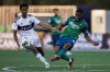 York United FC midfielder Elijah Adekugbe (8) clears a ball with Vancouver Whitecaps defender Ali Ahmed (22) defending in the first half of Canadian Championship quarterfinal soccer action in Toronto on Wednesday, May 10, 2023. Vancouver Whitecaps player Ali Ahmed left the Canadian Championship semifinal against Pacific FC on a stretcher in the first half.THE CANADIAN PRESS/Cole Burston
