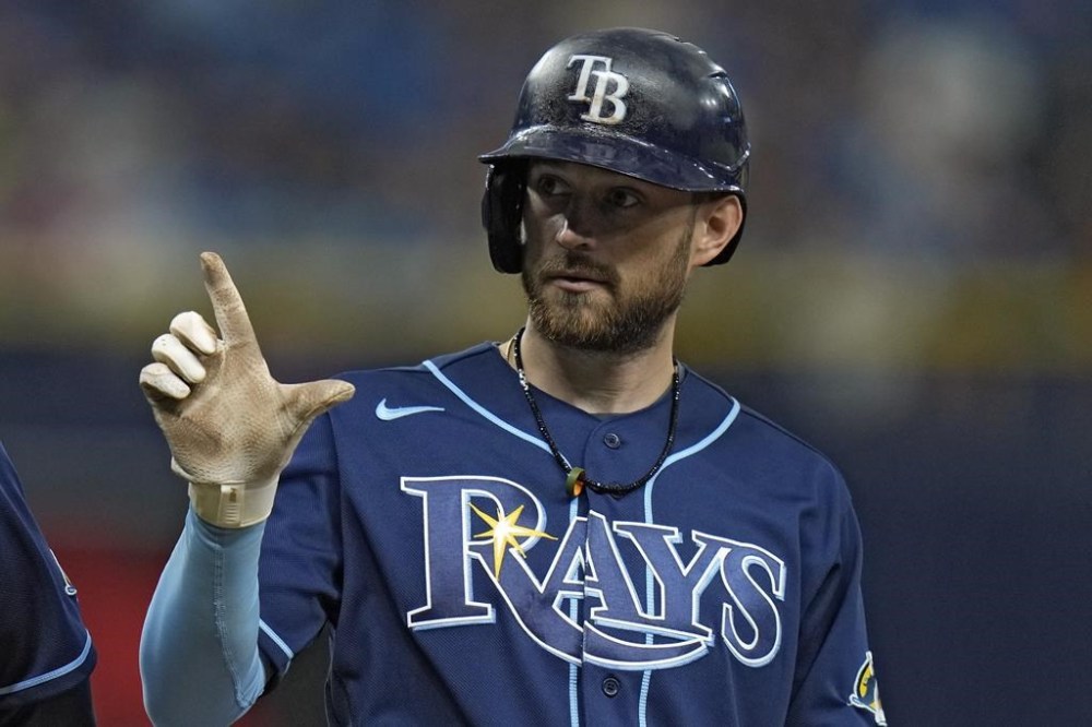 Tampa Bay Rays' Brandon Lowe reacts after his single off Toronto Blue Jays relief pitcher Adam Cimber during the ninth inning of a baseball game Thursday, May 25, 2023, in St. Petersburg, Fla. (AP Photo/Chris O'Meara)