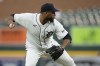 Detroit Tigers relief pitcher Jose Cisnero fields the out hit by Chicago White Sox's Gavin Sheets during the seventh inning of a baseball game, Thursday, May 25, 2023, in Detroit. (AP Photo/Carlos Osorio)