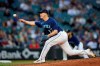 Seattle Mariners closing Paul Sewald throws to an Oakland Athletics batter during the ninth inning of a baseball game Thursday, May 25, 2023, in Seattle. The Mariners won 3-2. (AP Photo/John Froschauer)