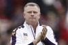 Coventry City manager Mark Robins celebrates following the Sky Bet Championship match at the Riverside Stadium, Middlesbrough, Monday May 8, 2023. On Saturday, May 27, 2023 Coventry takes on Luton in the Championship playoff final at Wembley Stadium for a place in the Premier League. (Richard Sellers/PA via AP)