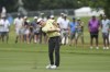 Scottie Scheffler hits an approach shot on the sixth hole during the second round of the Charles Schwab Challenge golf tournament at Colonial Country Club in Fort Worth, Texas, Friday, May 26, 2023. (AP Photo/LM Otero)