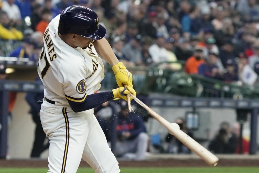 Milwaukee Brewers' Willy Adames breaks his bat as he grounds out during the third inning of a baseball game against the Houston Astros Wednesday, May 24, 2023, in Milwaukee. (AP Photo/Morry Gash)