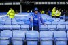 A Everton's fan stands dejected at the end of the English Premier League soccer match between Everton and Manchester City at the Goodison Park stadium in Liverpool, England, Sunday, May 14, 2023. Manchester City won 3-0. (AP Photo/Jon Super)
